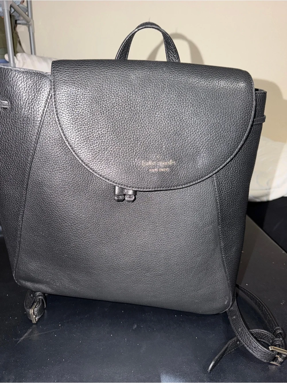 kate spade Black Pebbled Leather Backpack with Gold Logo